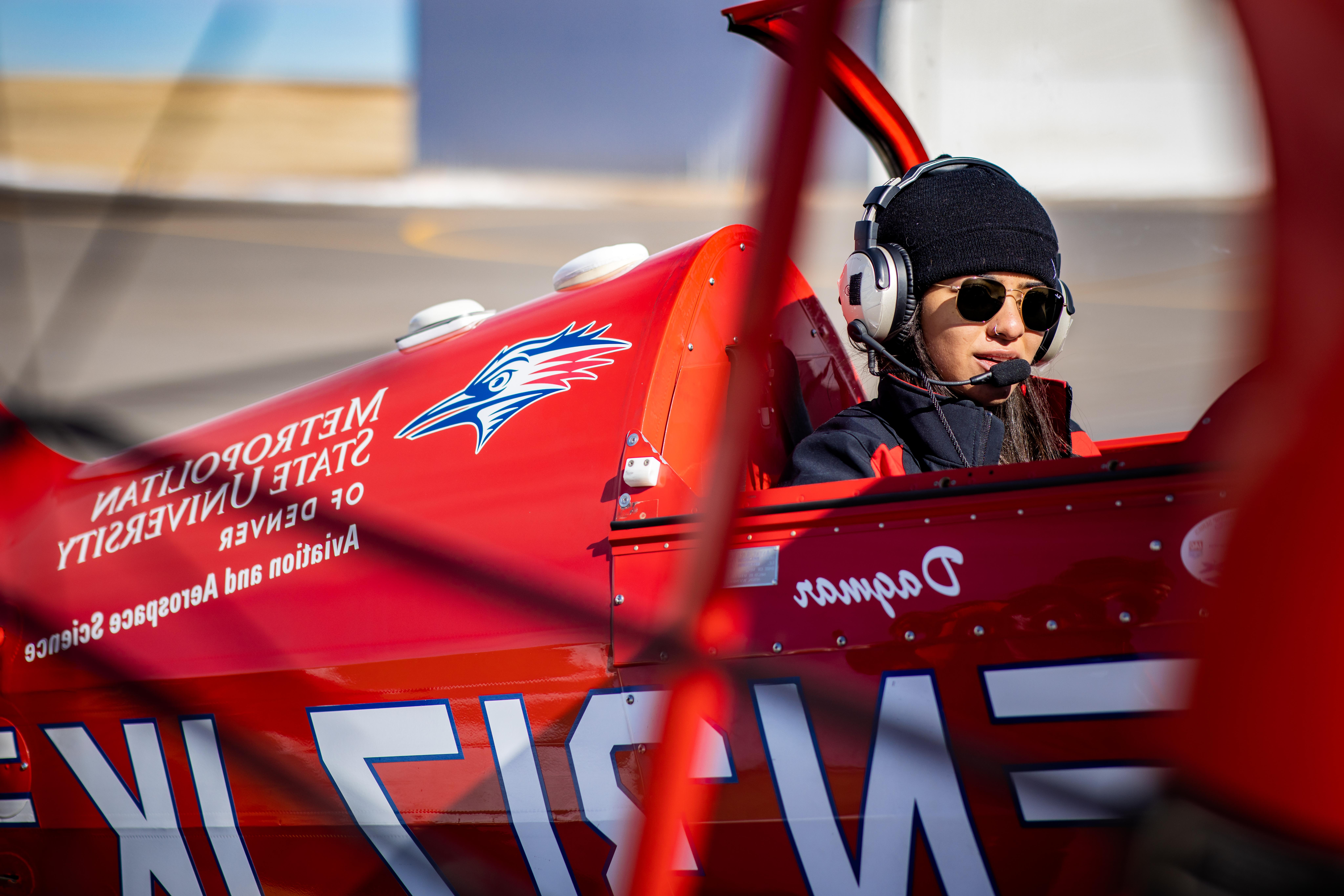 MSU Denver student, Haley Jo Brinson, Bachelor in Aerospace Sciences, major Professional Flight Officer sits in plane in preparation for flight departure on Feb. 12, 2022 at Fort Morgan Municipal Airport. Photo by Alyson McClaran