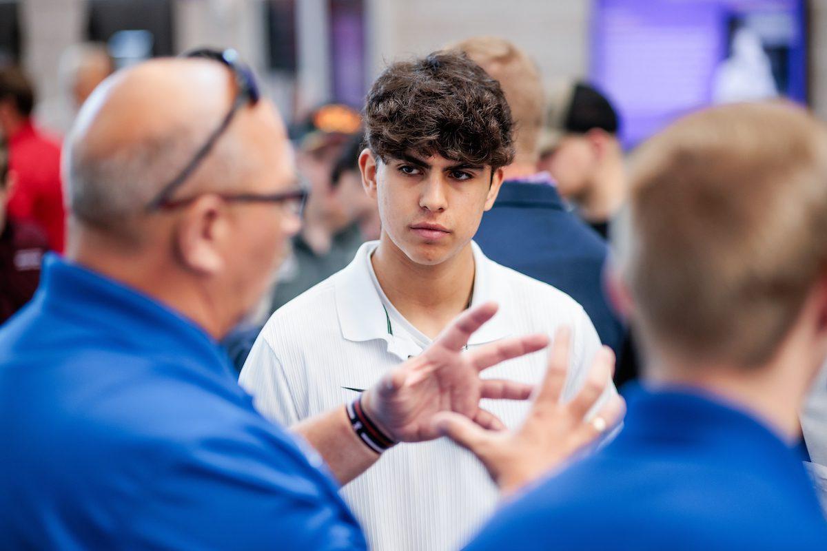 Students talk to different booths during the Aviation and Aerospace Science orientation on Aug. 18, 2023. Photo by Alyson McClaran